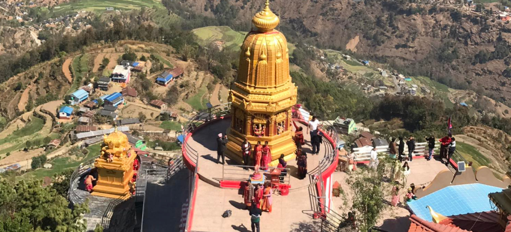 पञ्चकोट बागलुङ को सुन्दर दृश्य, हरियाली पहाडहरू र धार्मिक स्थलहरूको आकर्षक झलक।